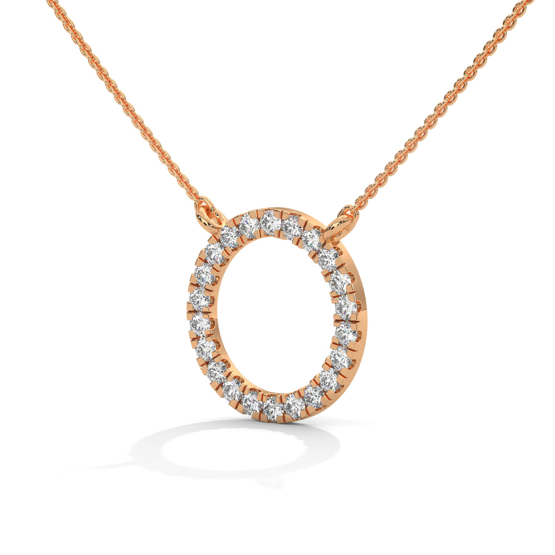 Rose gold necklace with a circular pendant featuring diamonds on a white background