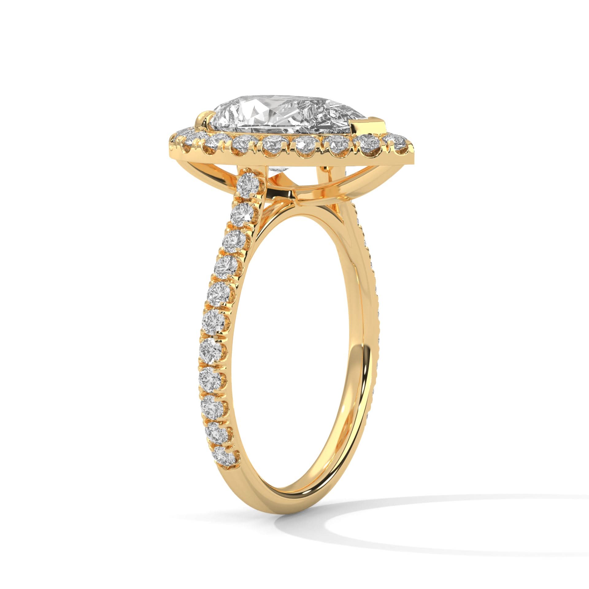 Gold ring with a diamond halo on a white background