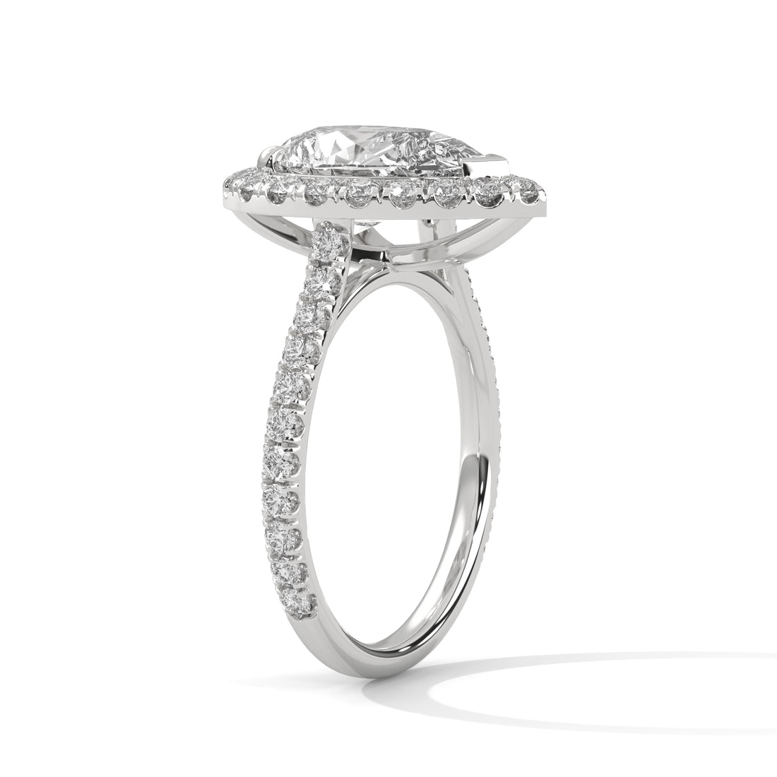 Diamond ring with a white gold band on a white background