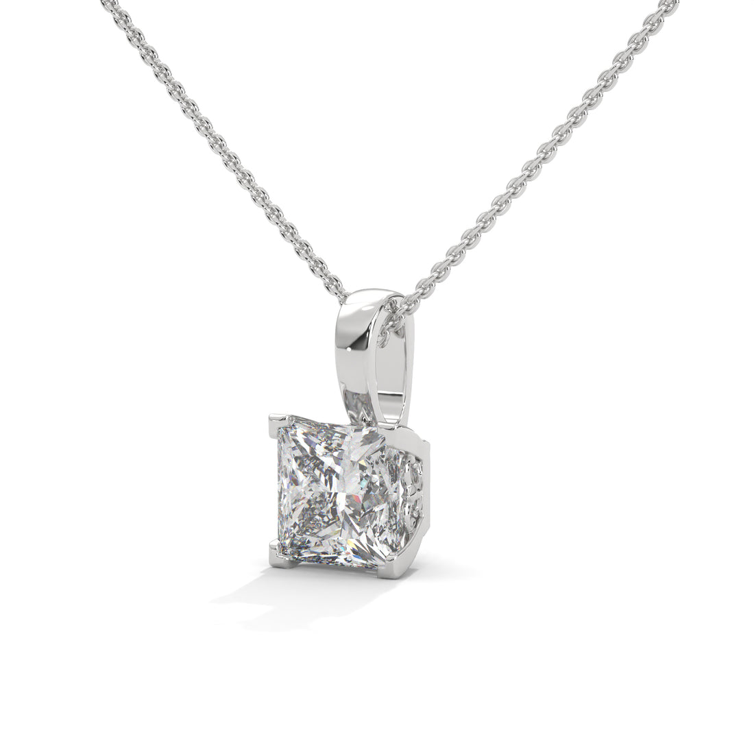Diamond pendant on a chain against a white background