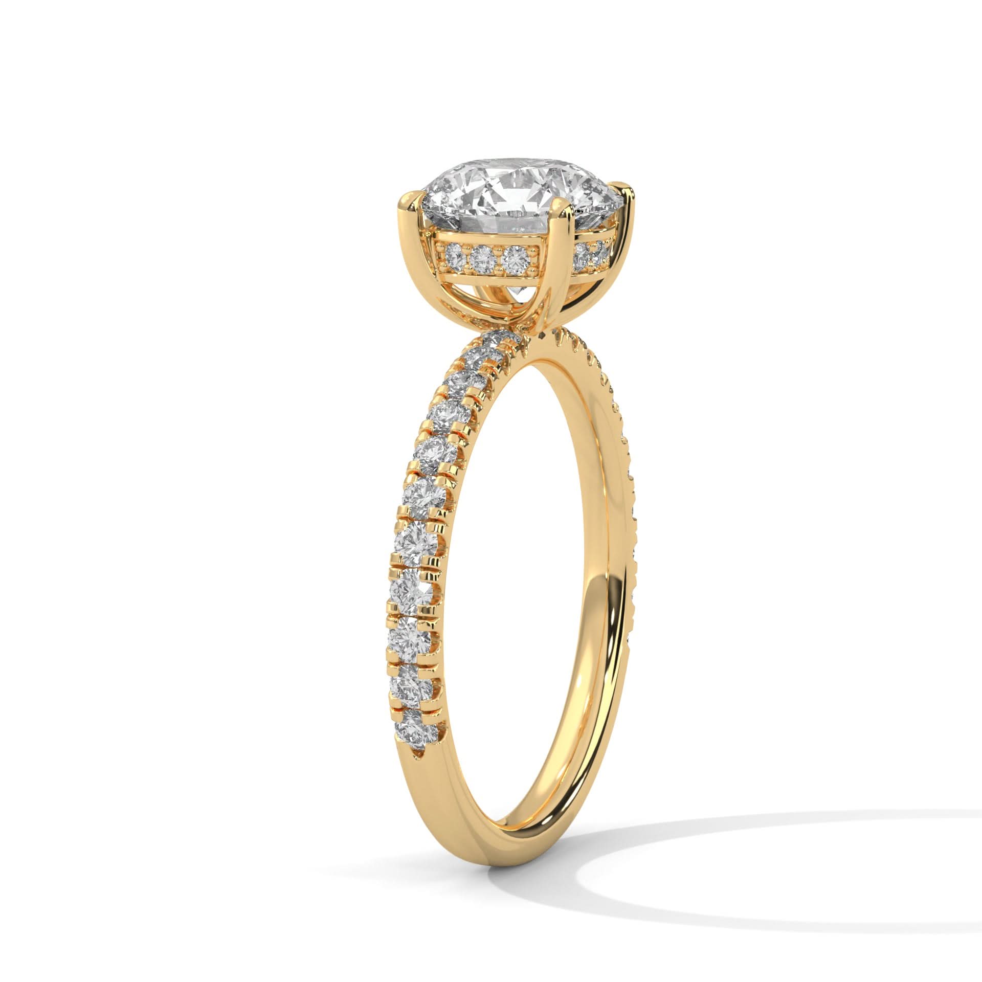 Gold ring with a diamond on a white background