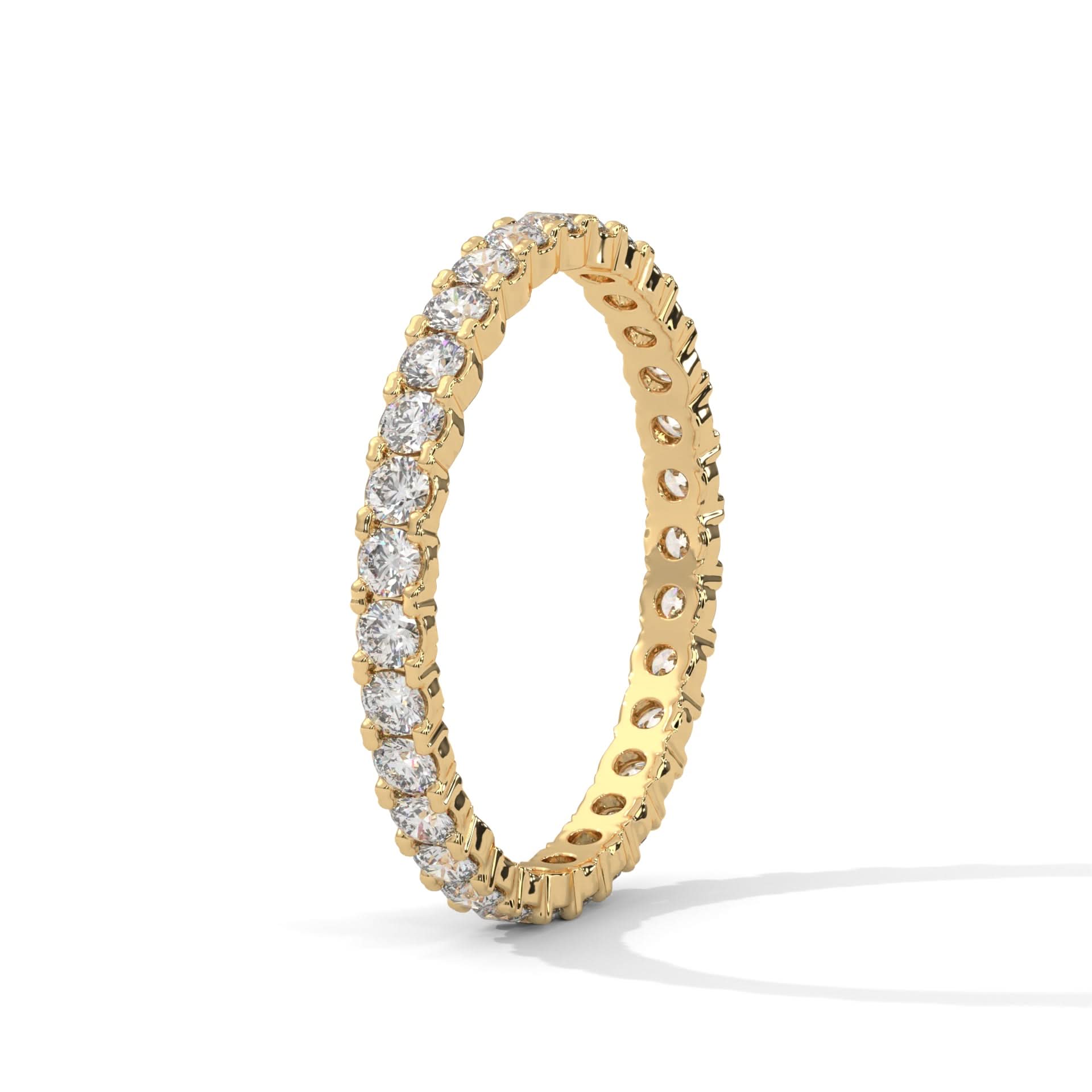 Gold ring with diamonds on a white background