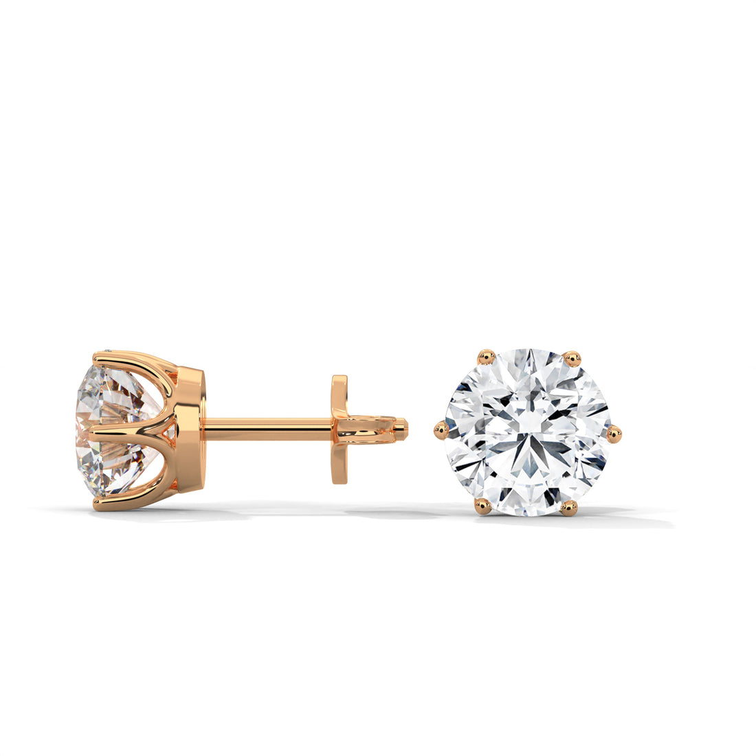 Rose gold diamond stud earrings on a white background