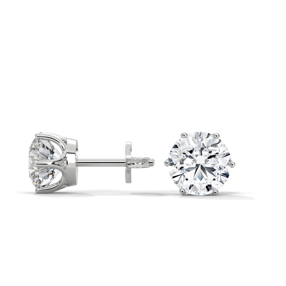Diamond stud earrings on a white background