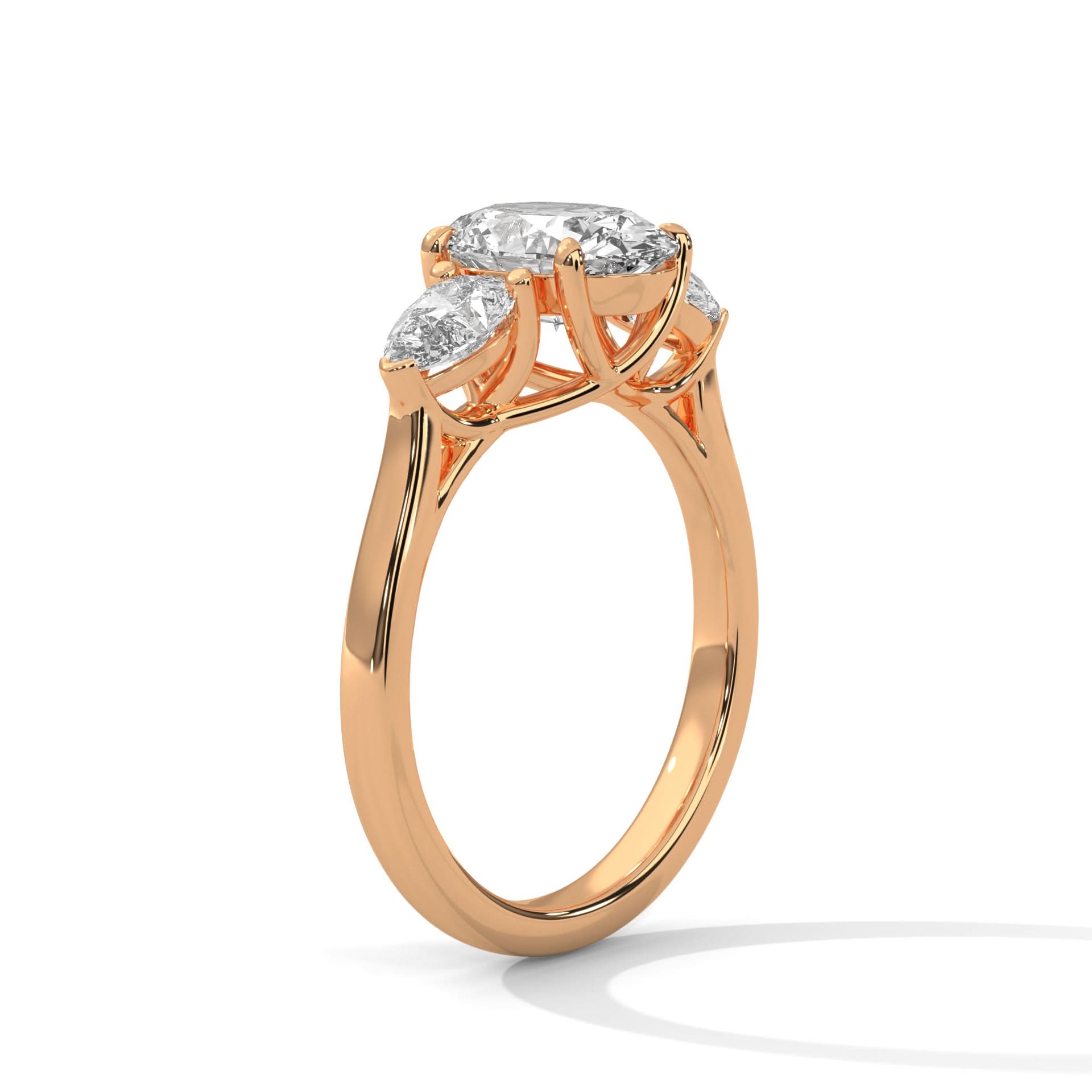 Rose gold ring with three diamonds on a white background