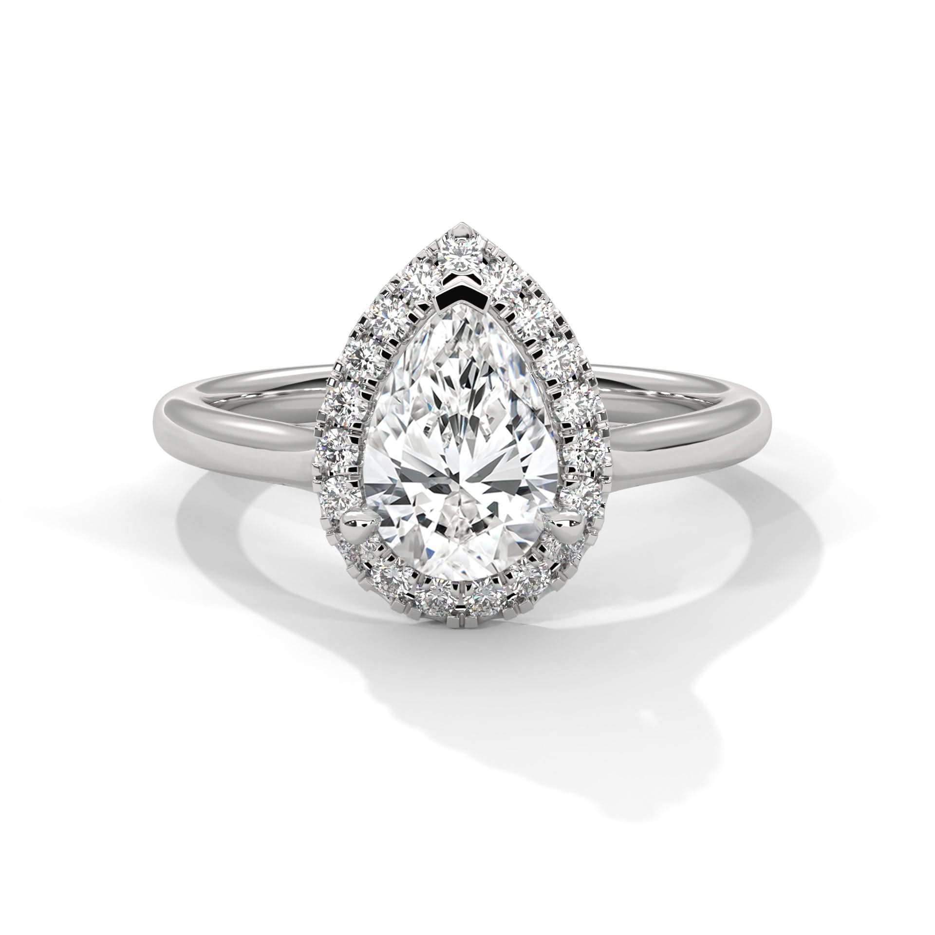 Diamond ring with pear-shaped center stone on a white background