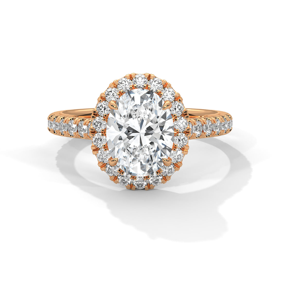 Rose gold ring with Oval diamond and smaller diamonds on a white background