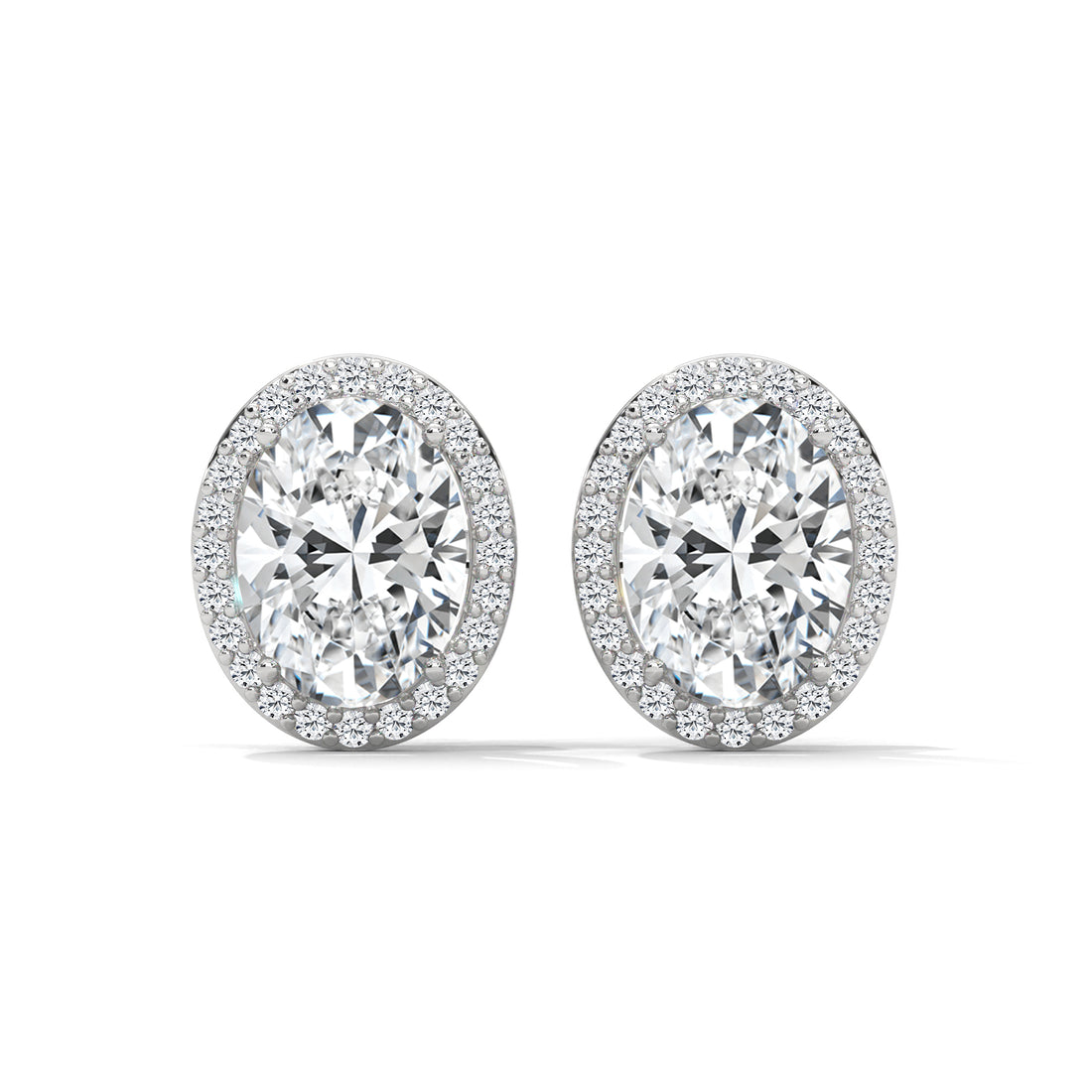 Pair of Oval diamond earrings on a white background