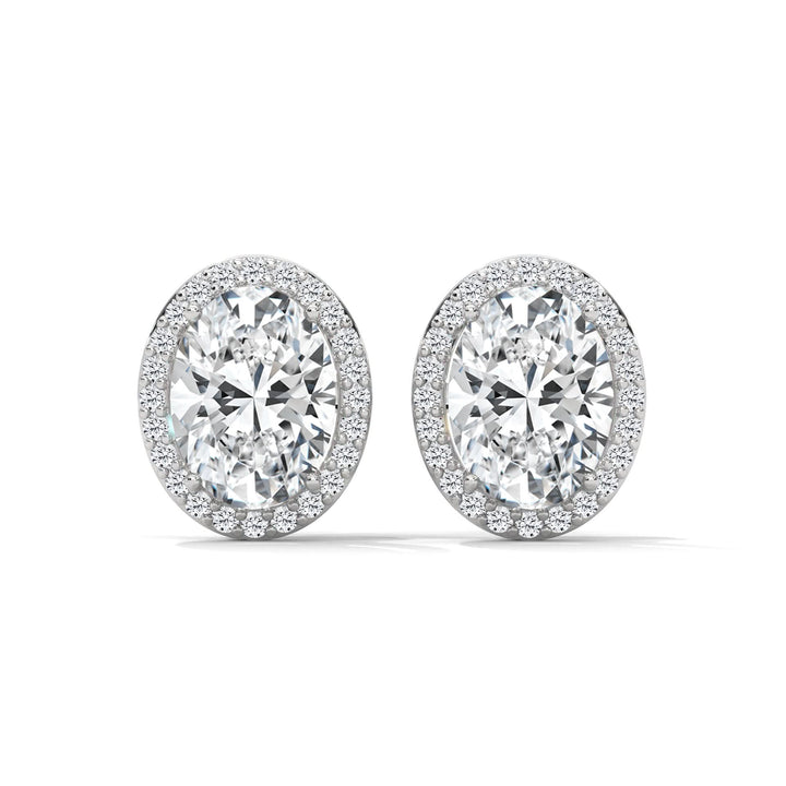 Pair of Oval diamond earrings on a white background