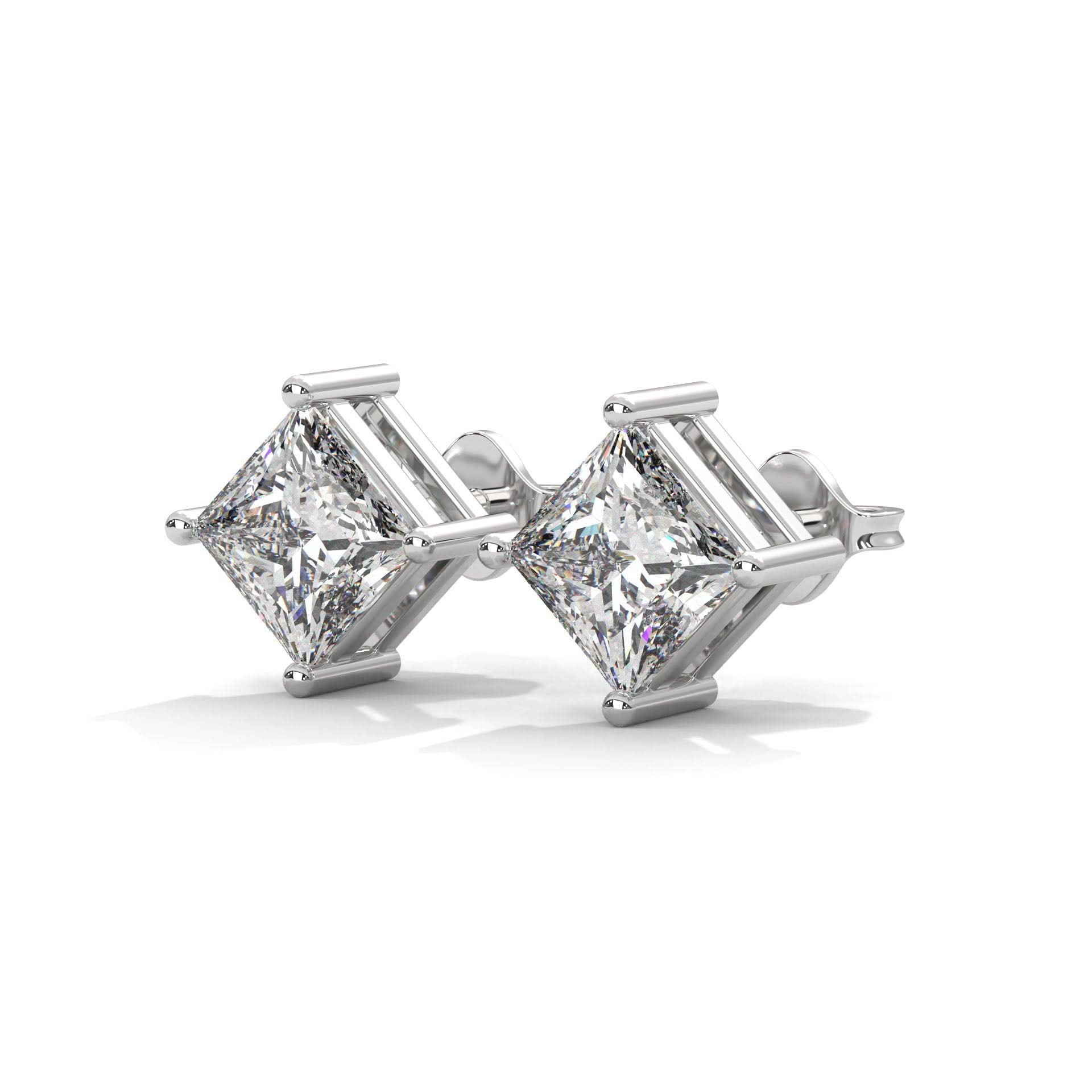 Pair of diamond stud earrings on a white background