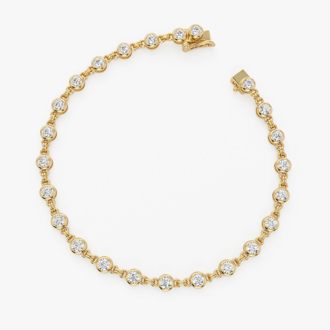 Gold bracelet with clear stones on a white background