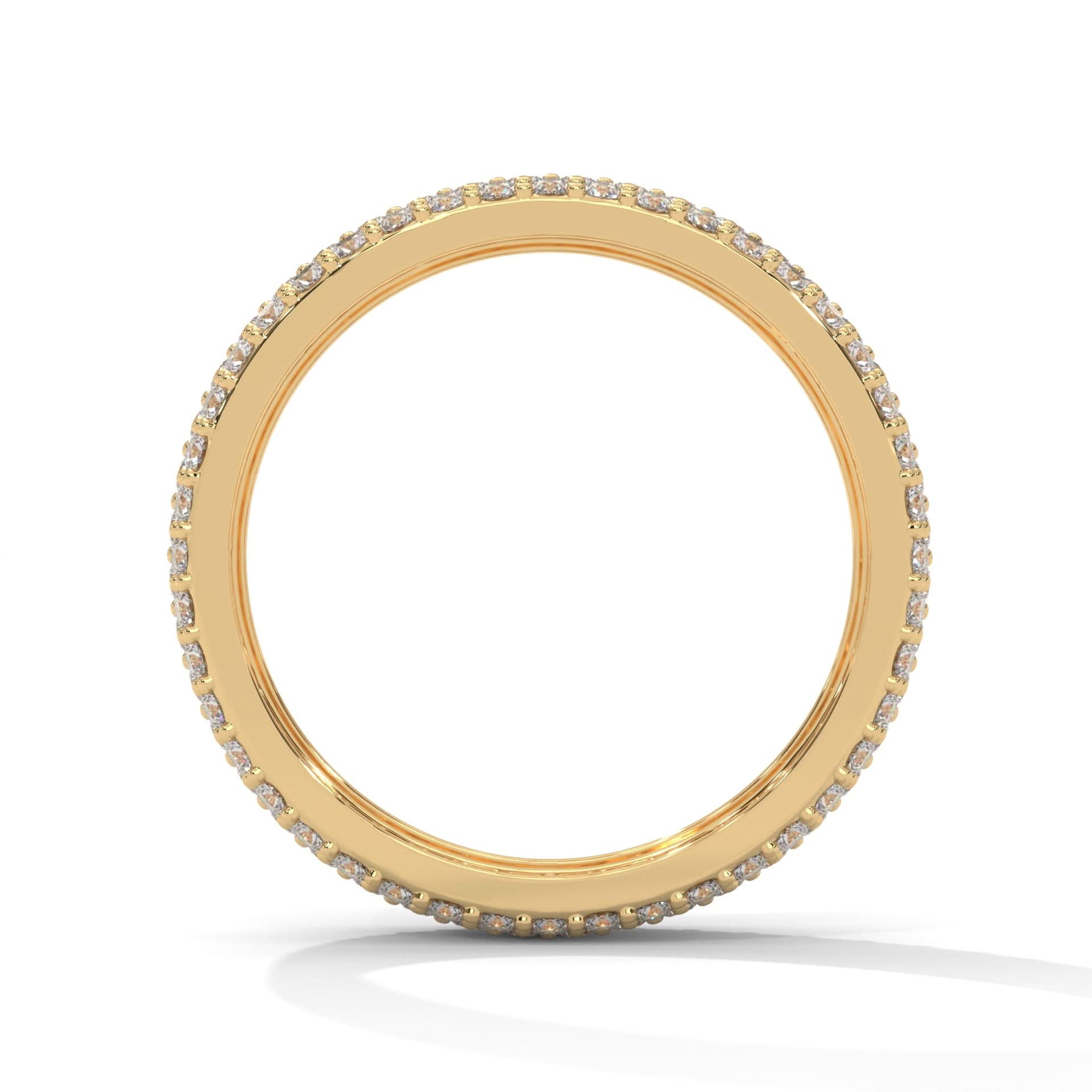 Gold ring with small diamonds on a white background