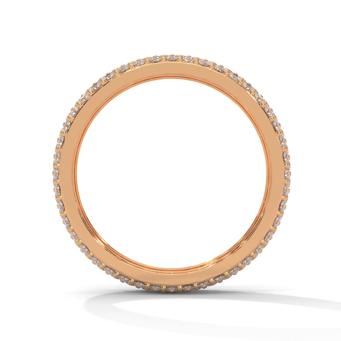 Rose gold ring with small diamonds on a white background