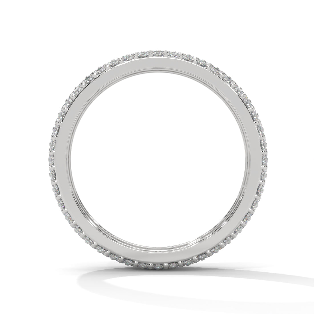 Silver ring with small diamonds on a white background