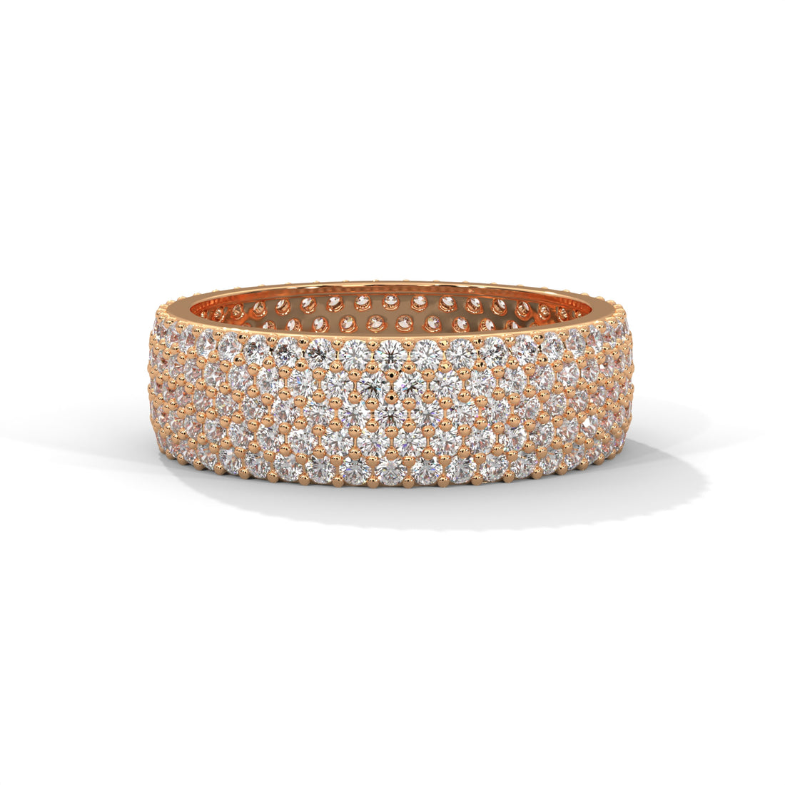 Rose gold ring with diamond accents on a white background