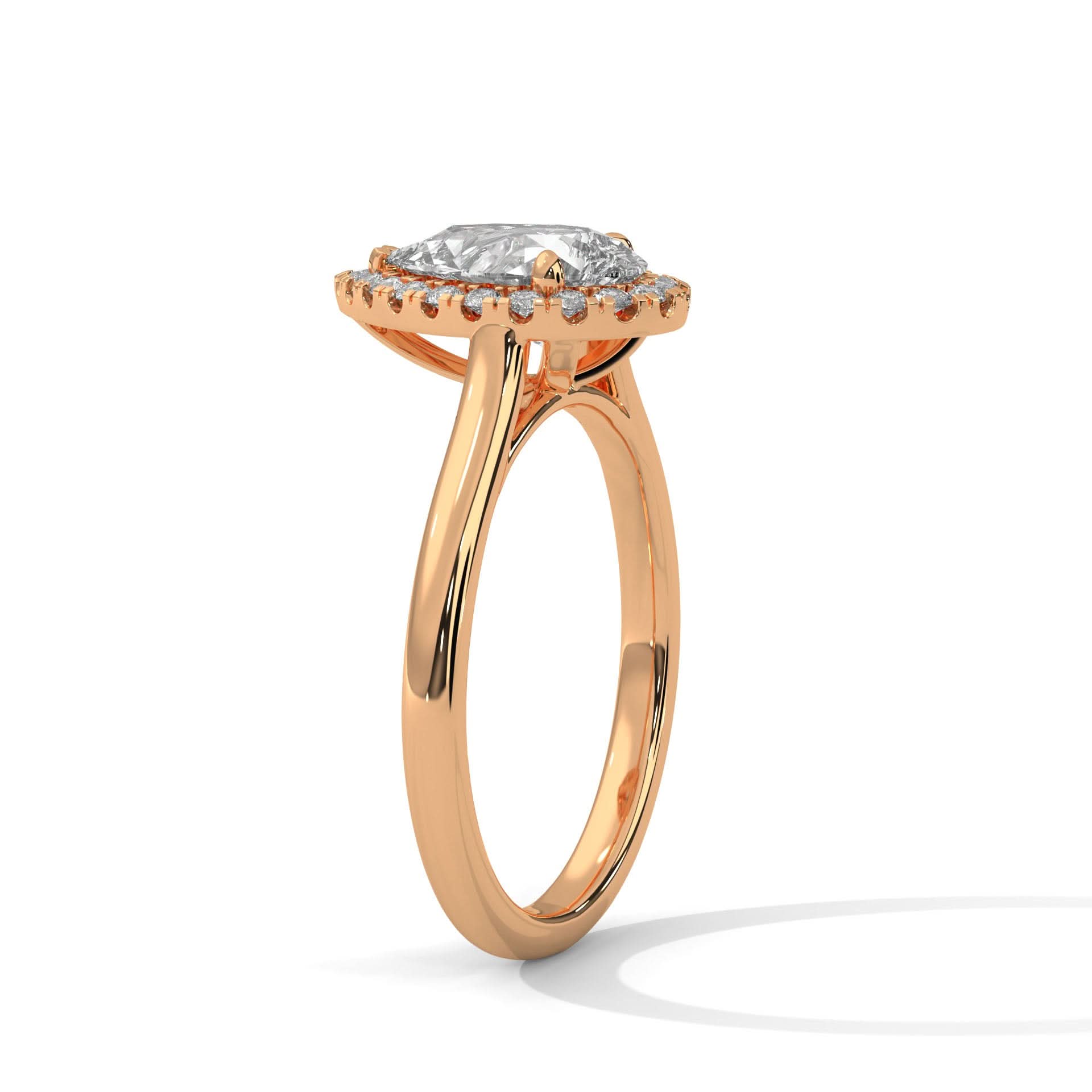 Rose gold ring with a diamond on a white background