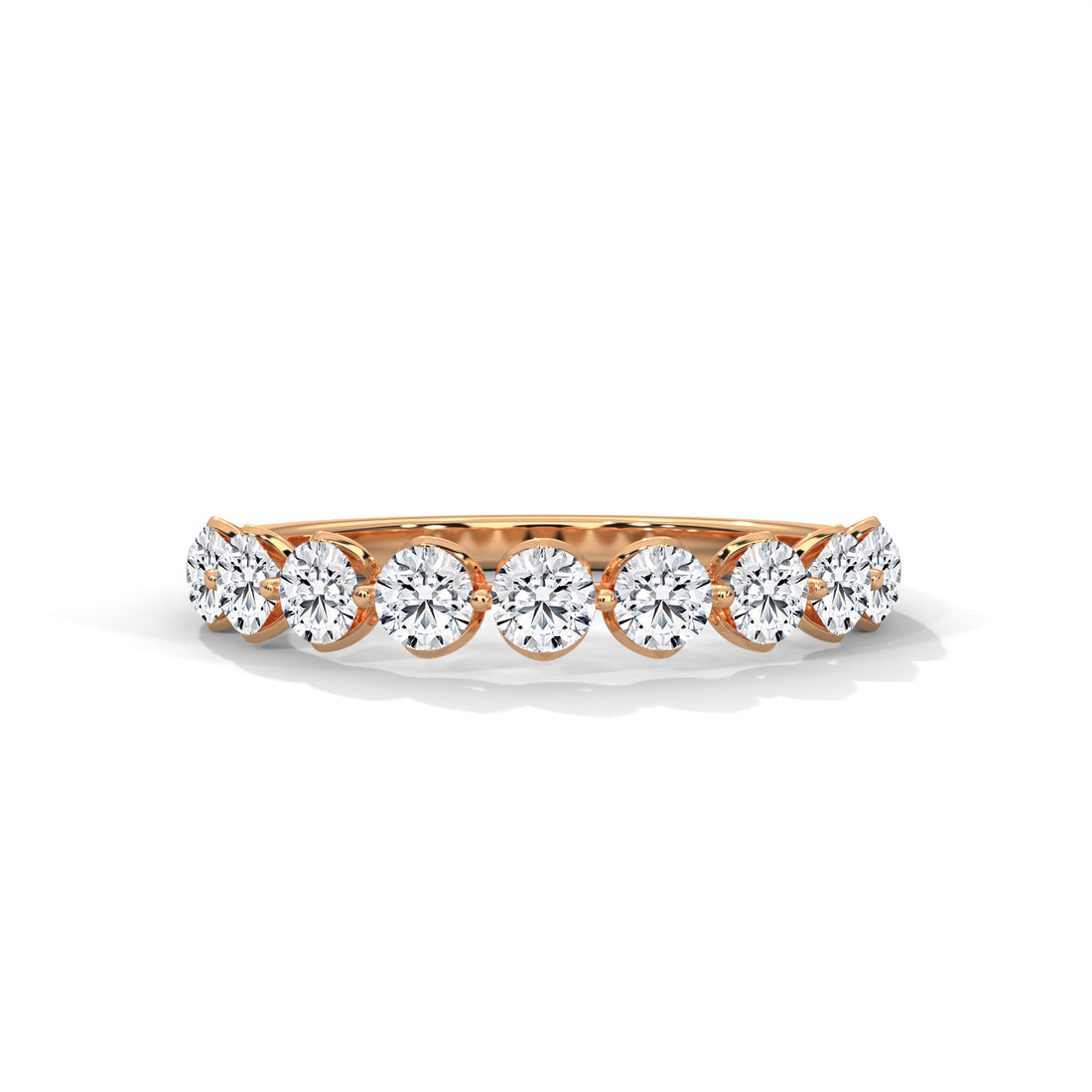Rose gold diamond ring on a white background