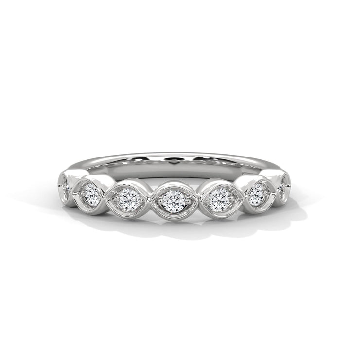 Silver ring with diamonds on a white background