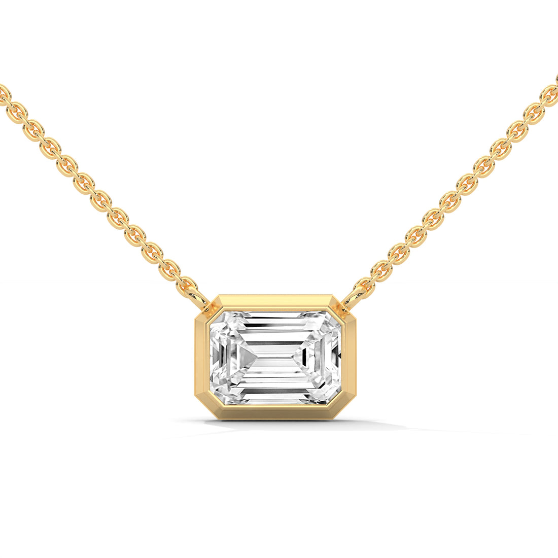 Gold necklace with a diamond pendant on a white background