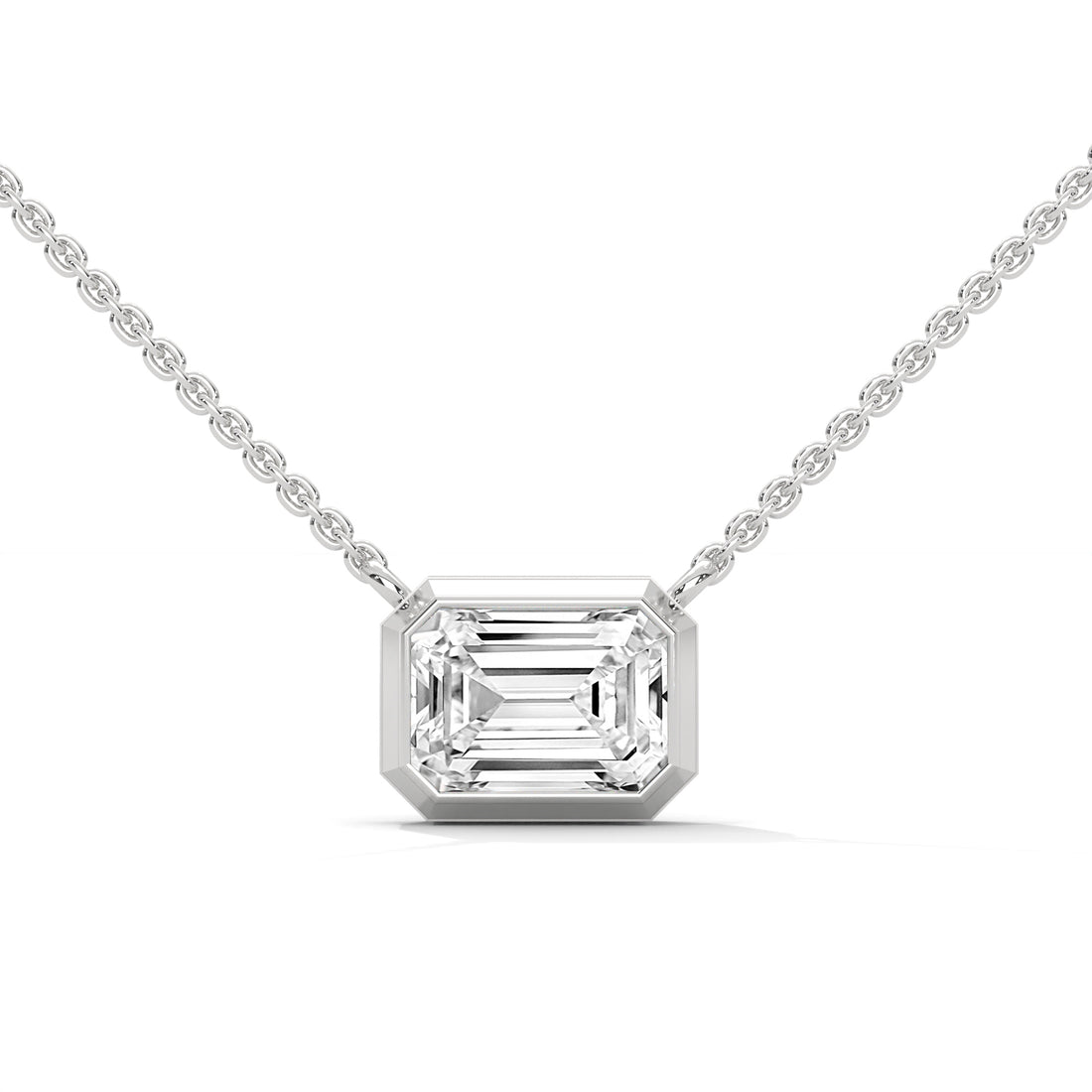 Diamond necklace with emerald-cut pendant on a white background