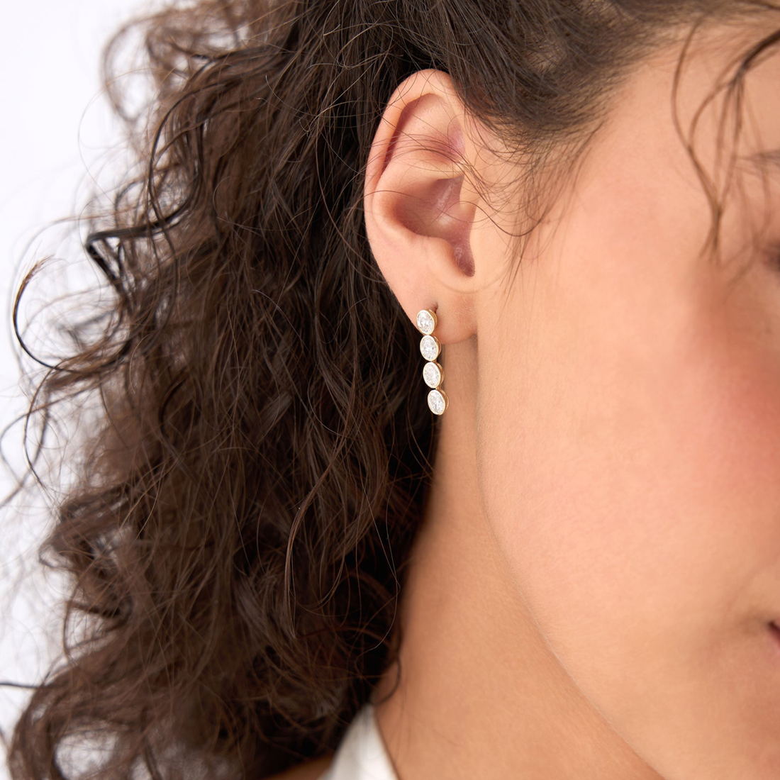 Bezel Set Oval Cut Dangling Diamond Earrings