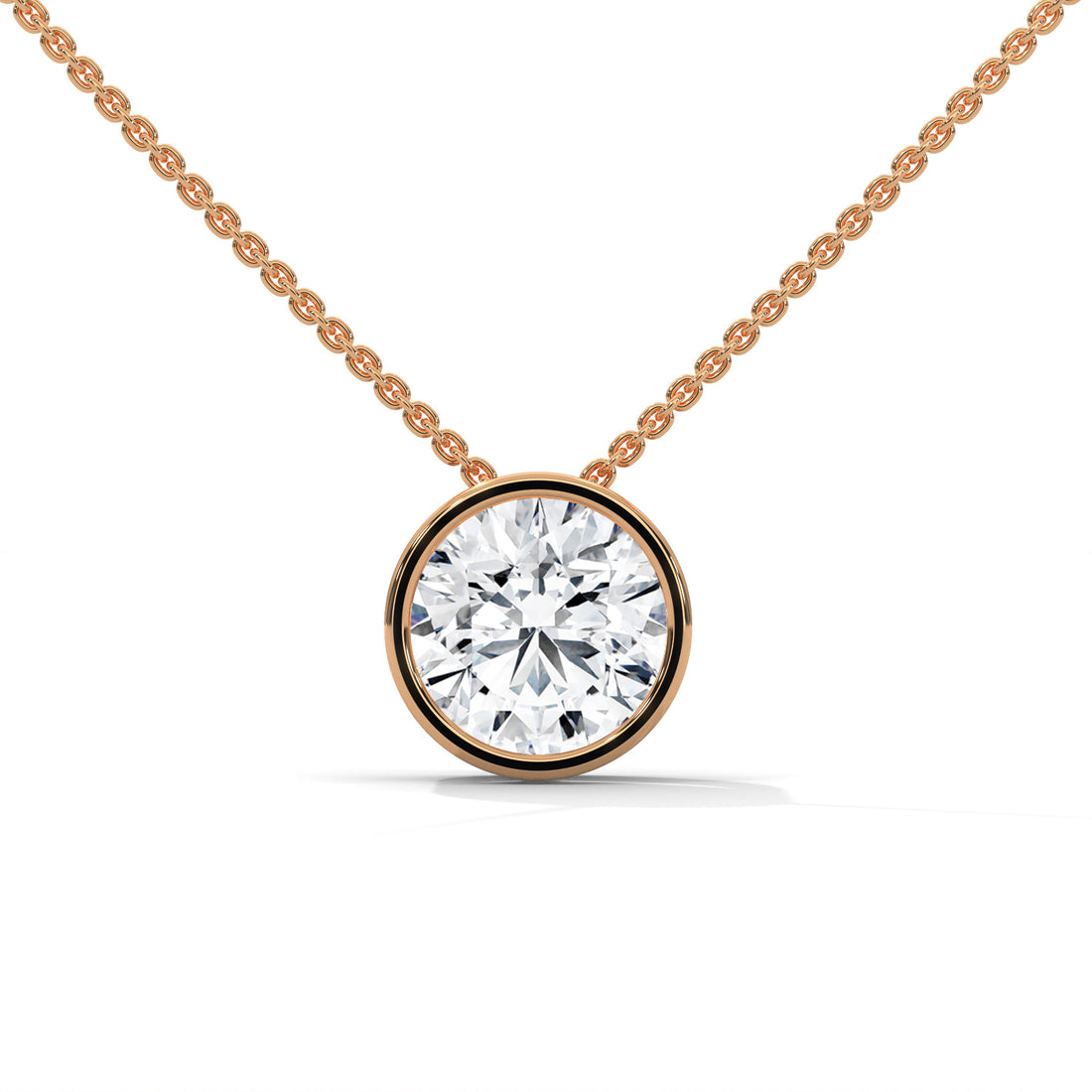 Rose gold necklace with a round diamond pendant on a white background
