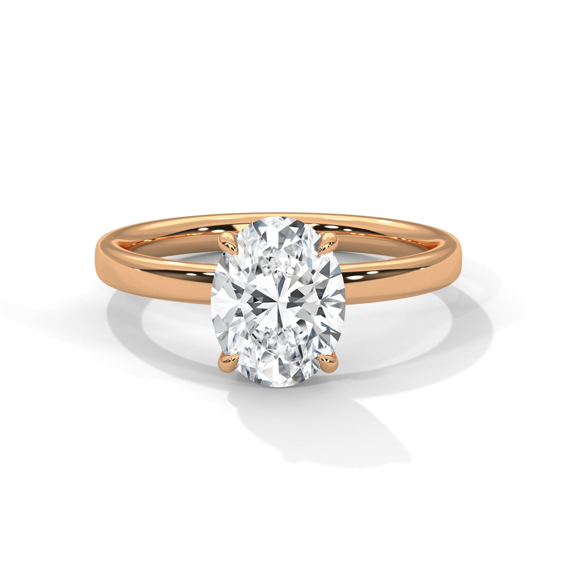 Rose gold ring with a large diamond on a white background