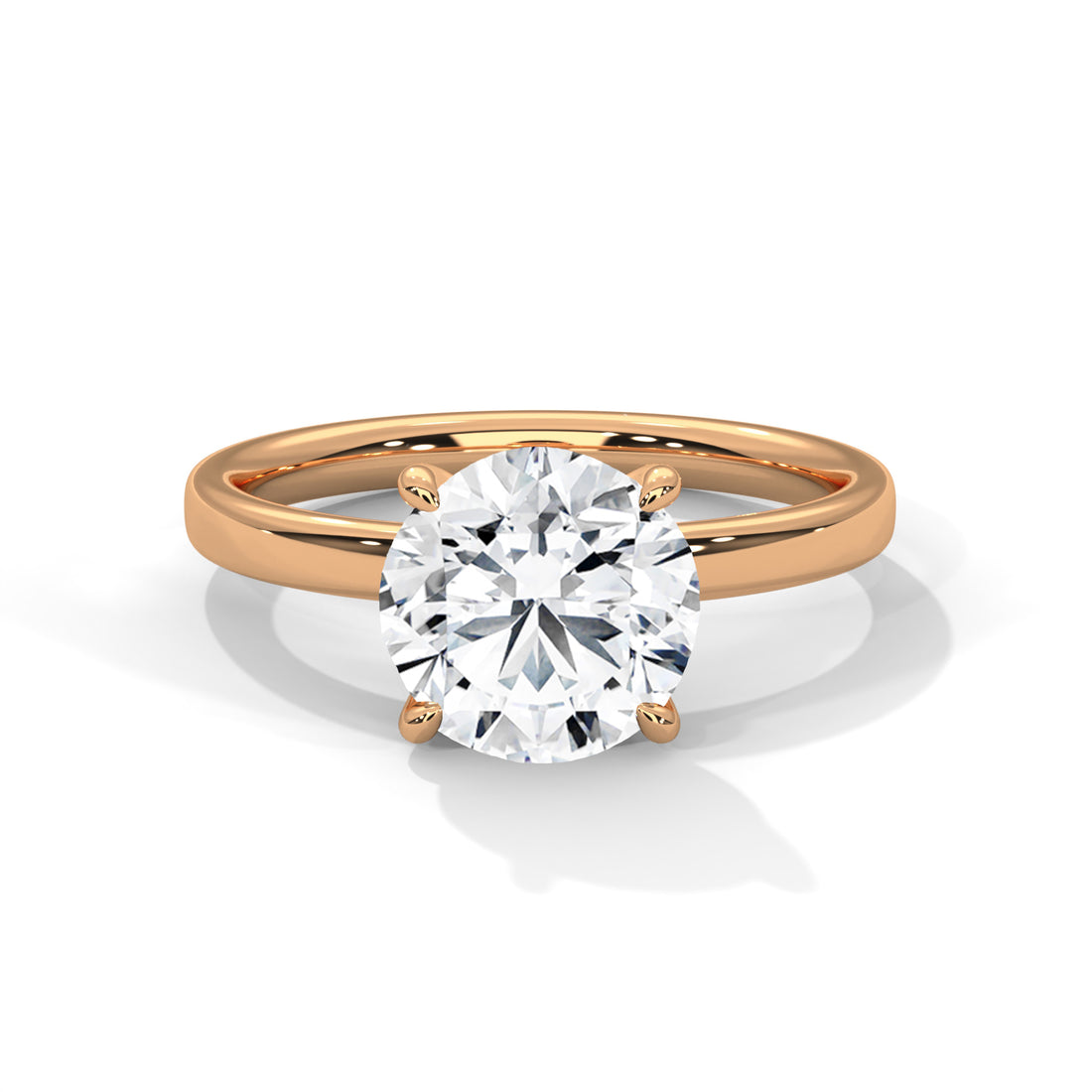 Rose gold ring with a large diamond on a white background