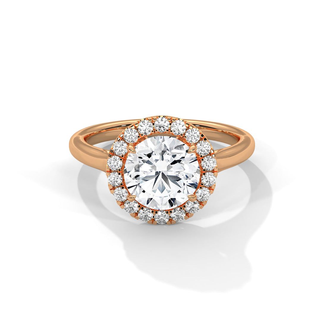 Rose gold ring with a large diamond and smaller diamonds around on a white background