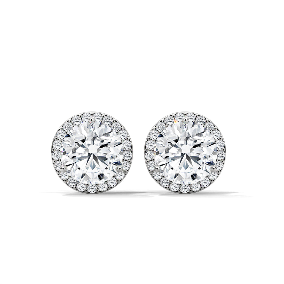 Pair of diamond stud earrings on a white background