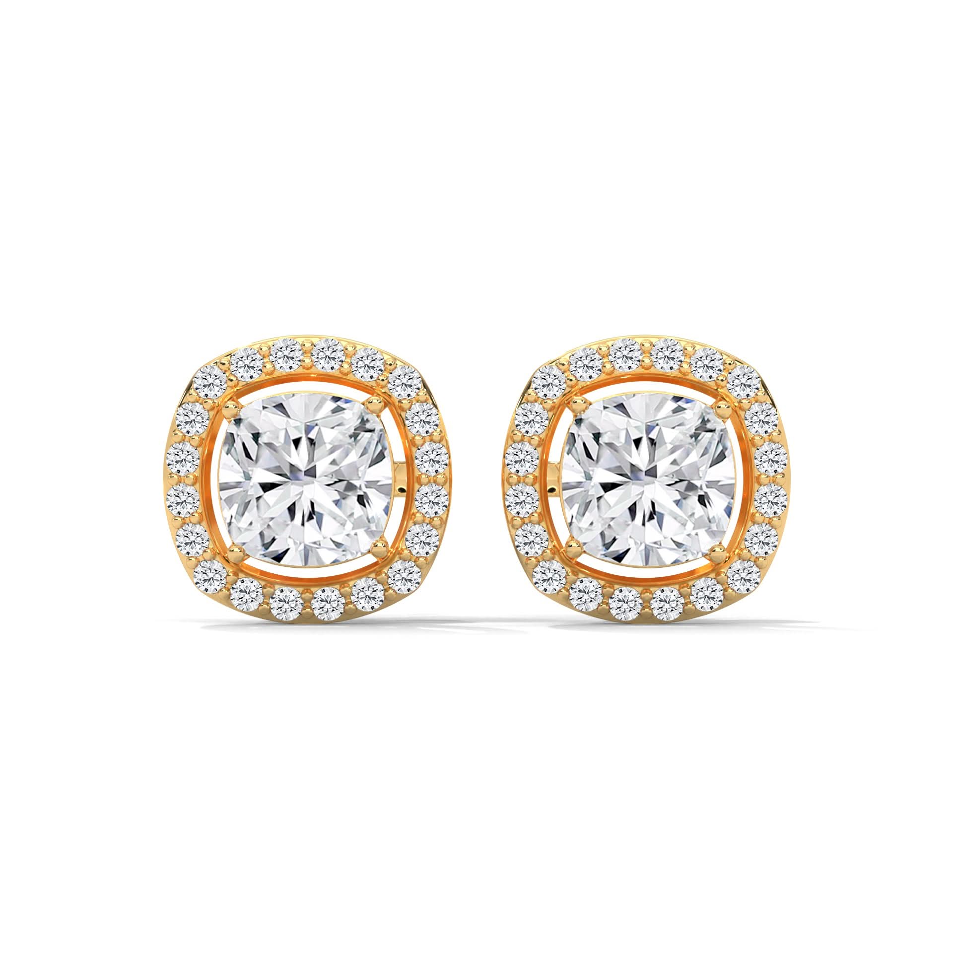Gold and silver stud earrings with clear gemstones on a white background