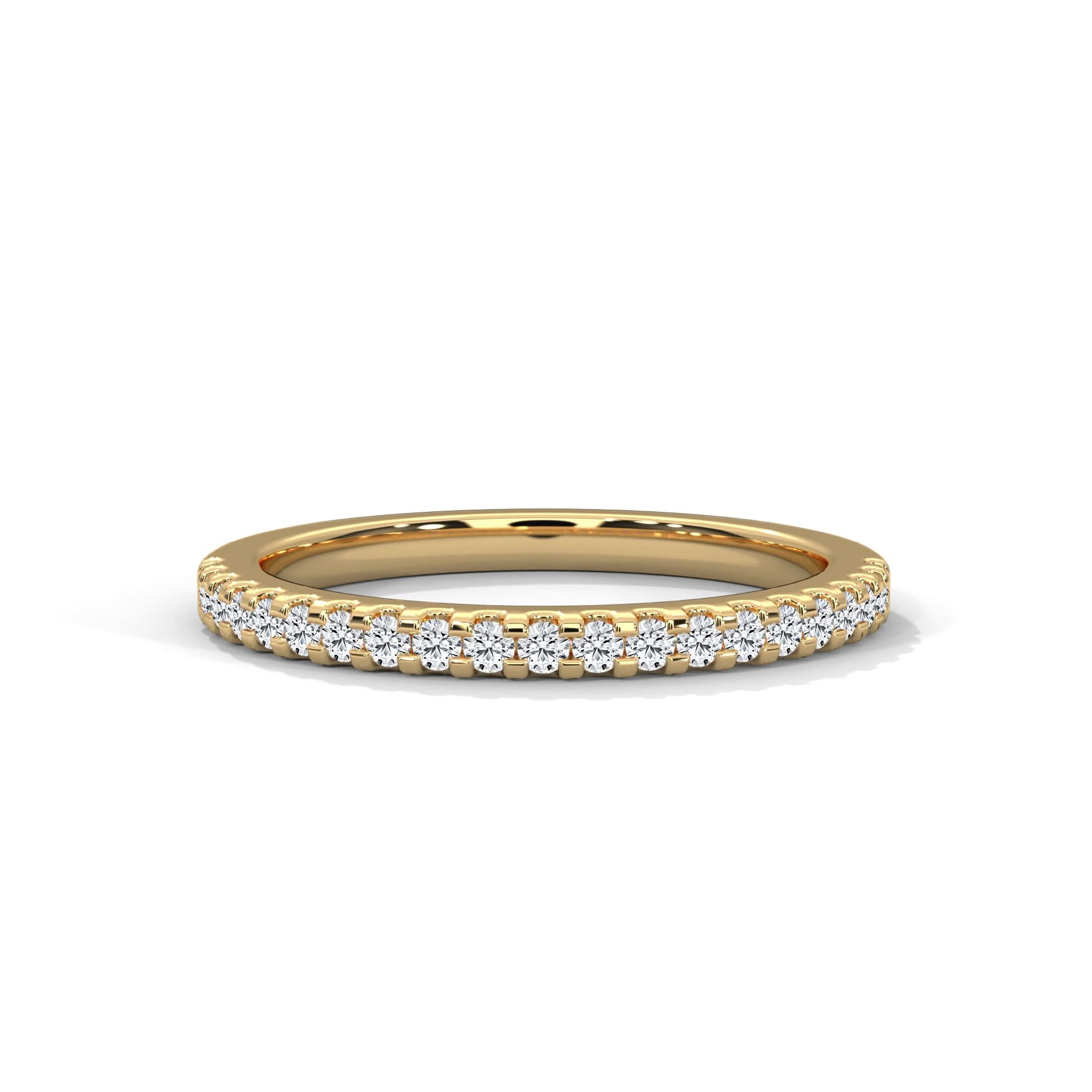 Gold ring with diamonds on a white background