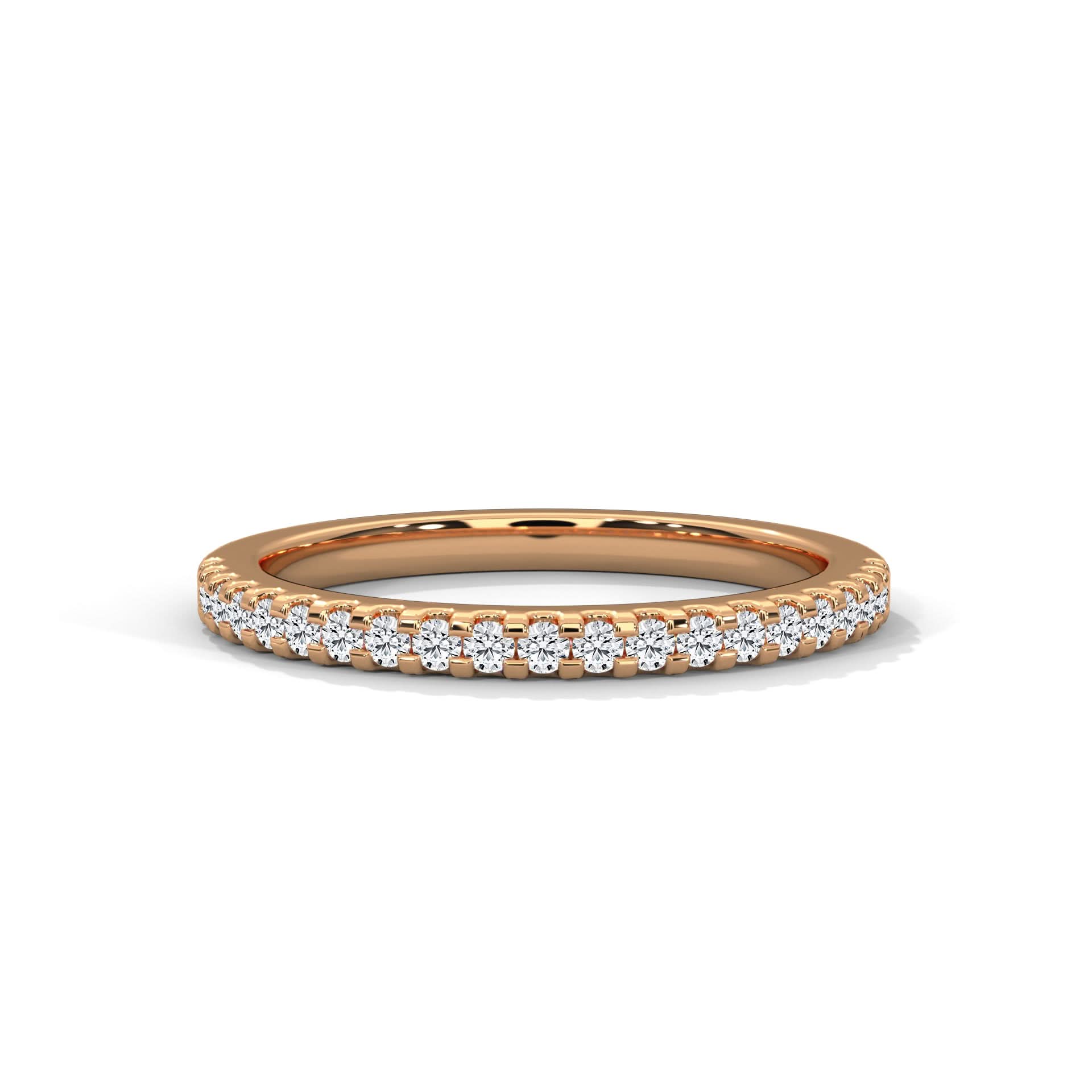 Rose gold ring with diamonds on a white background