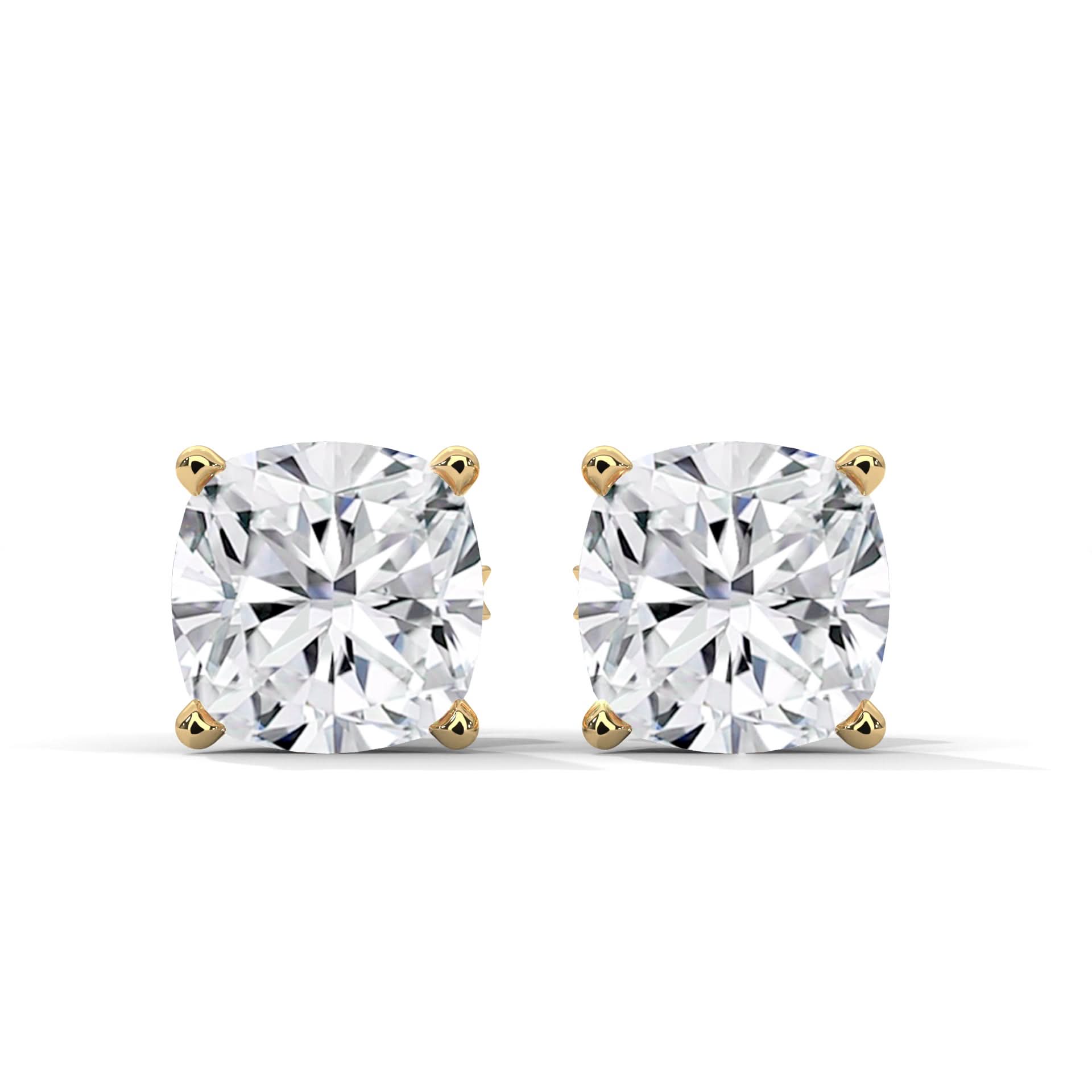 Pair of diamond stud earrings on a white background