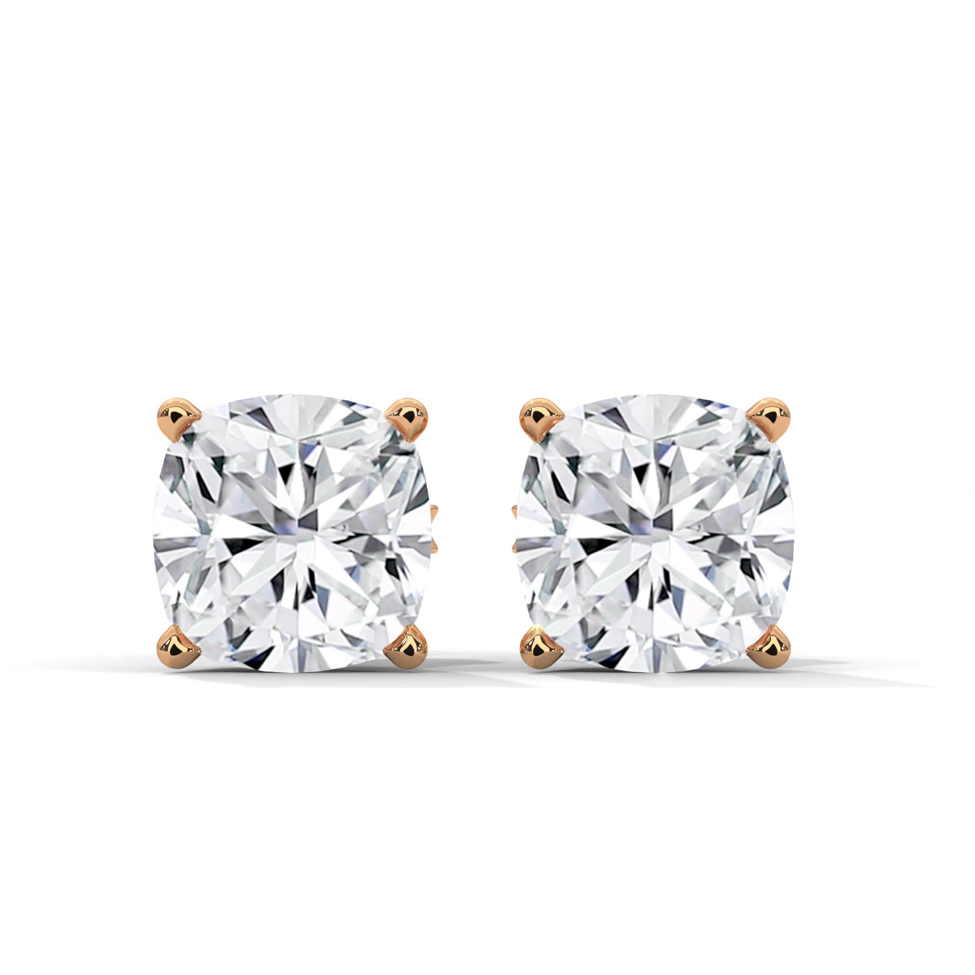 Pair of diamond stud earrings on a white background