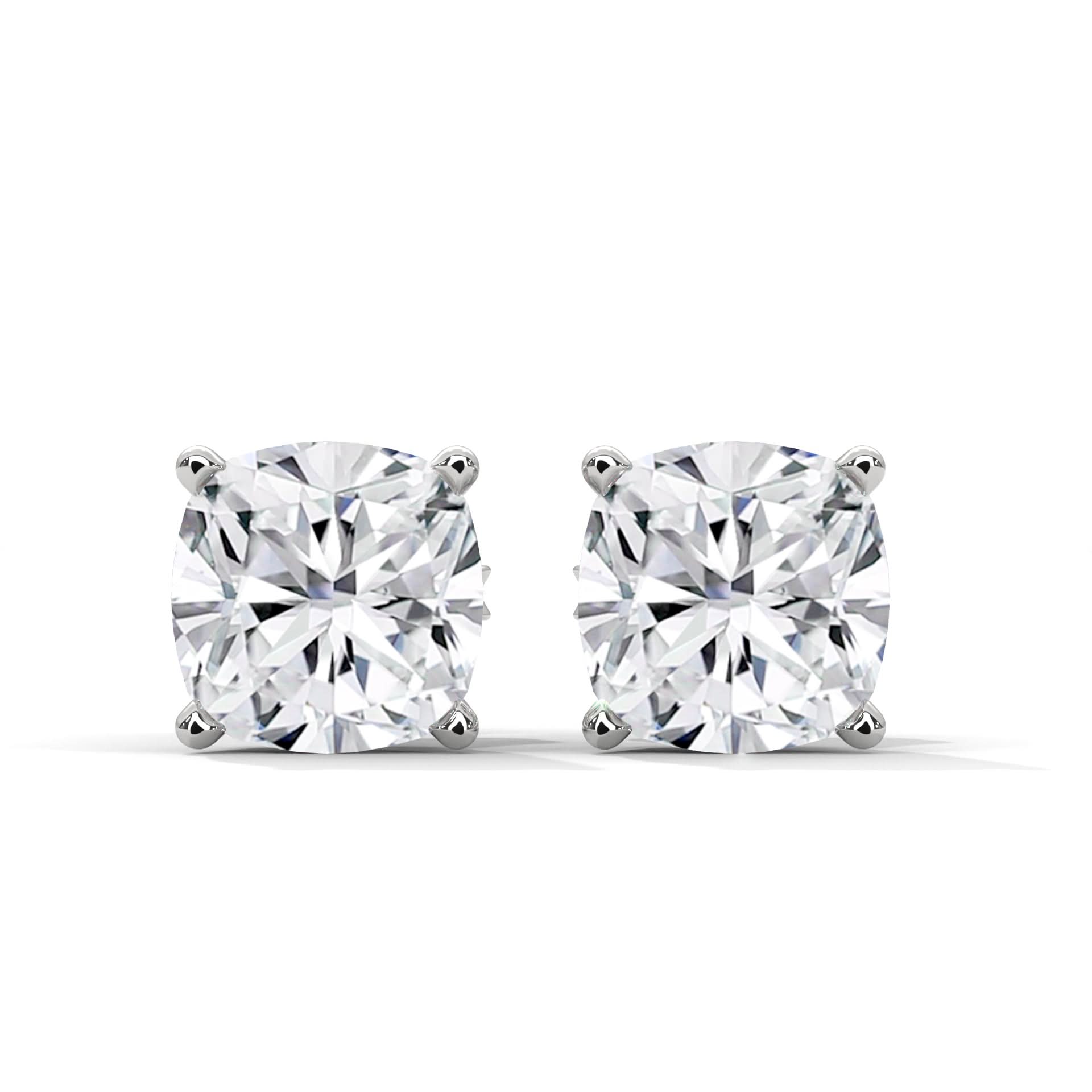 Pair of diamond stud earrings on a white background