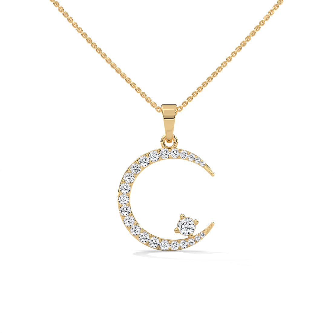 Gold necklace with a crescent moon pendant on a white background