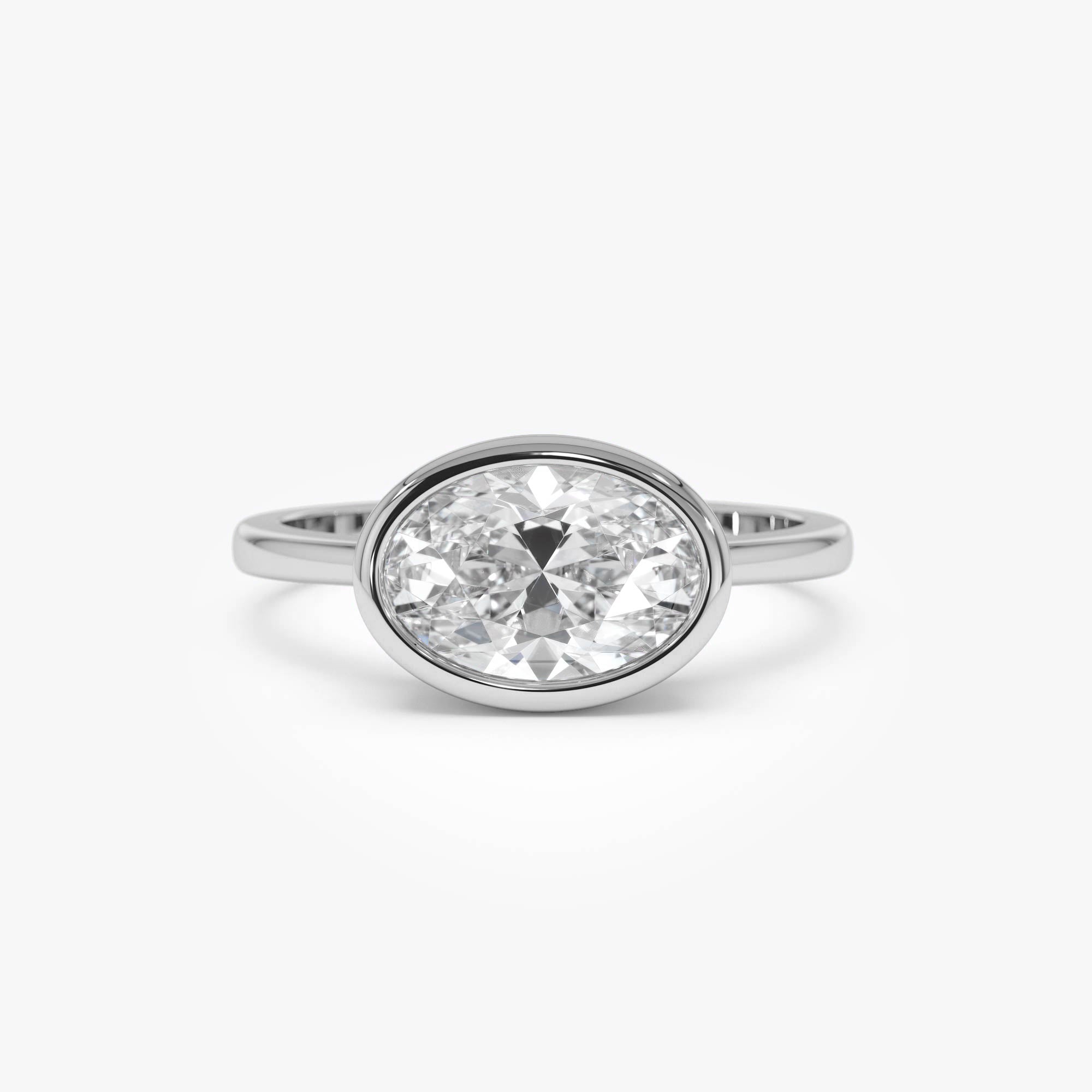 East West Classic Oval Shaped Lab Diamond Bezel Set Engagement Ring