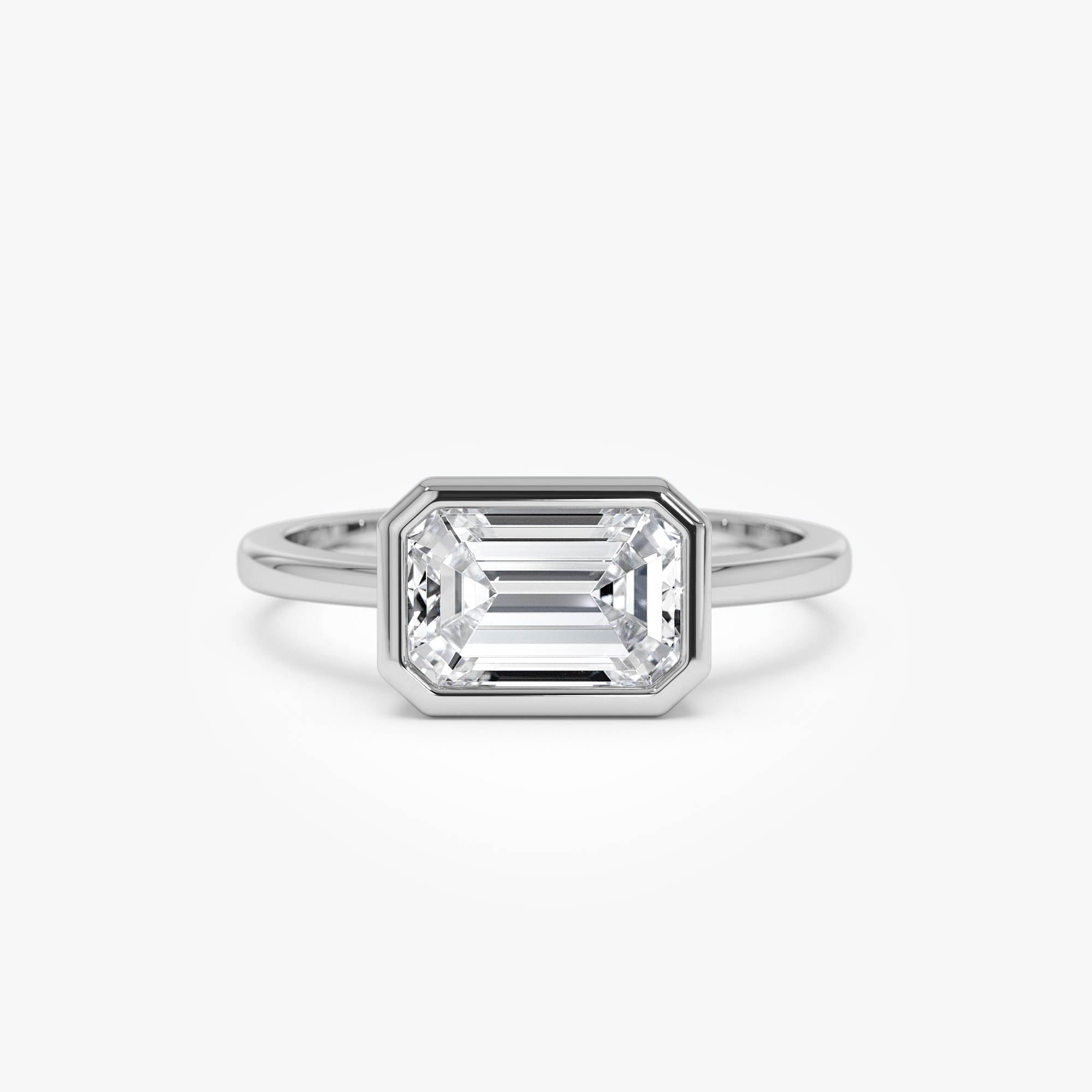 East West Emerald Cut Lab Grown Bezel Setting Engagement Ring