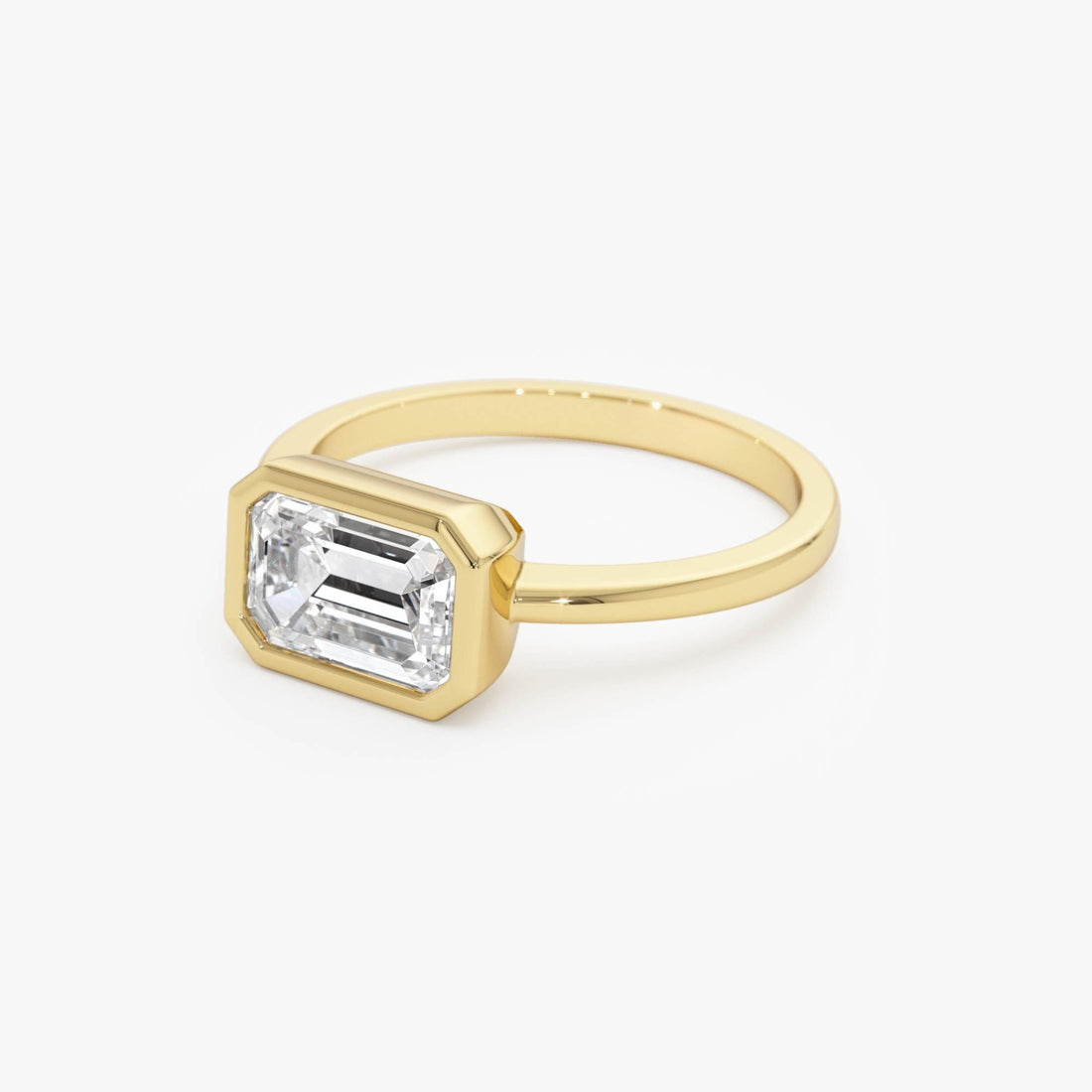 East West Emerald Cut Lab Grown Bezel Setting Engagement Ring