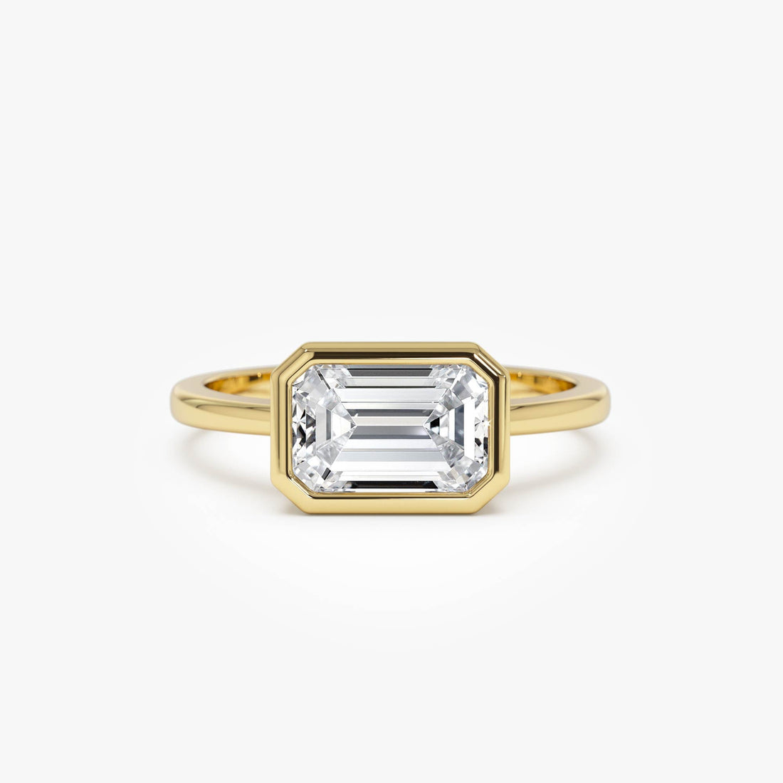 East West Emerald Cut Lab Grown Bezel Setting Engagement Ring