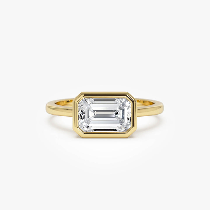 East West Emerald Cut Lab Grown Bezel Setting Engagement Ring
