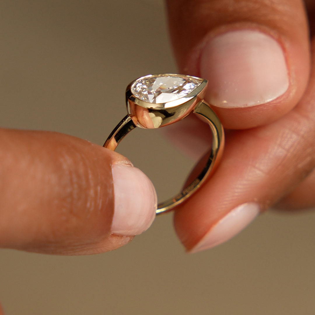 East West Pear Shaped Lab Grown Diamond Bezel Setting Engagement Ring