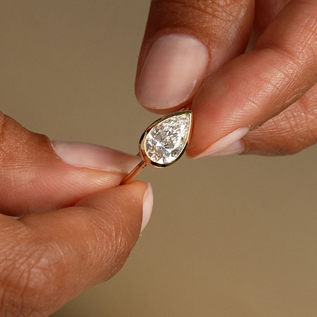 East West Pear Shaped Lab Grown Diamond Bezel Setting Engagement Ring