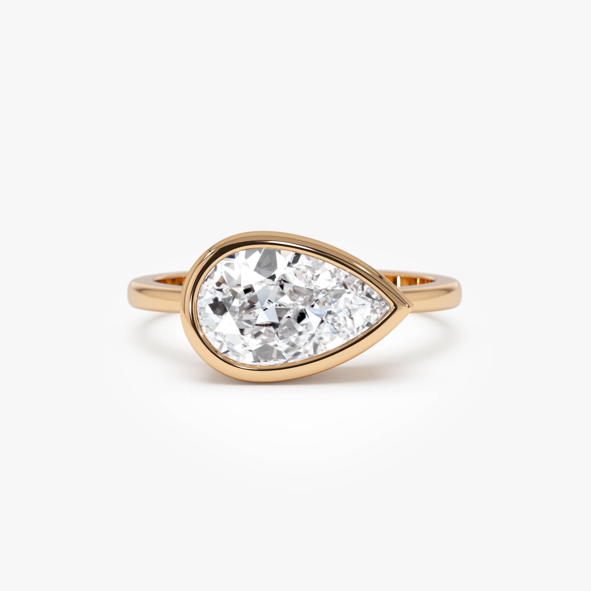 East West Pear Shaped Lab Grown Diamond Bezel Setting Engagement Ring