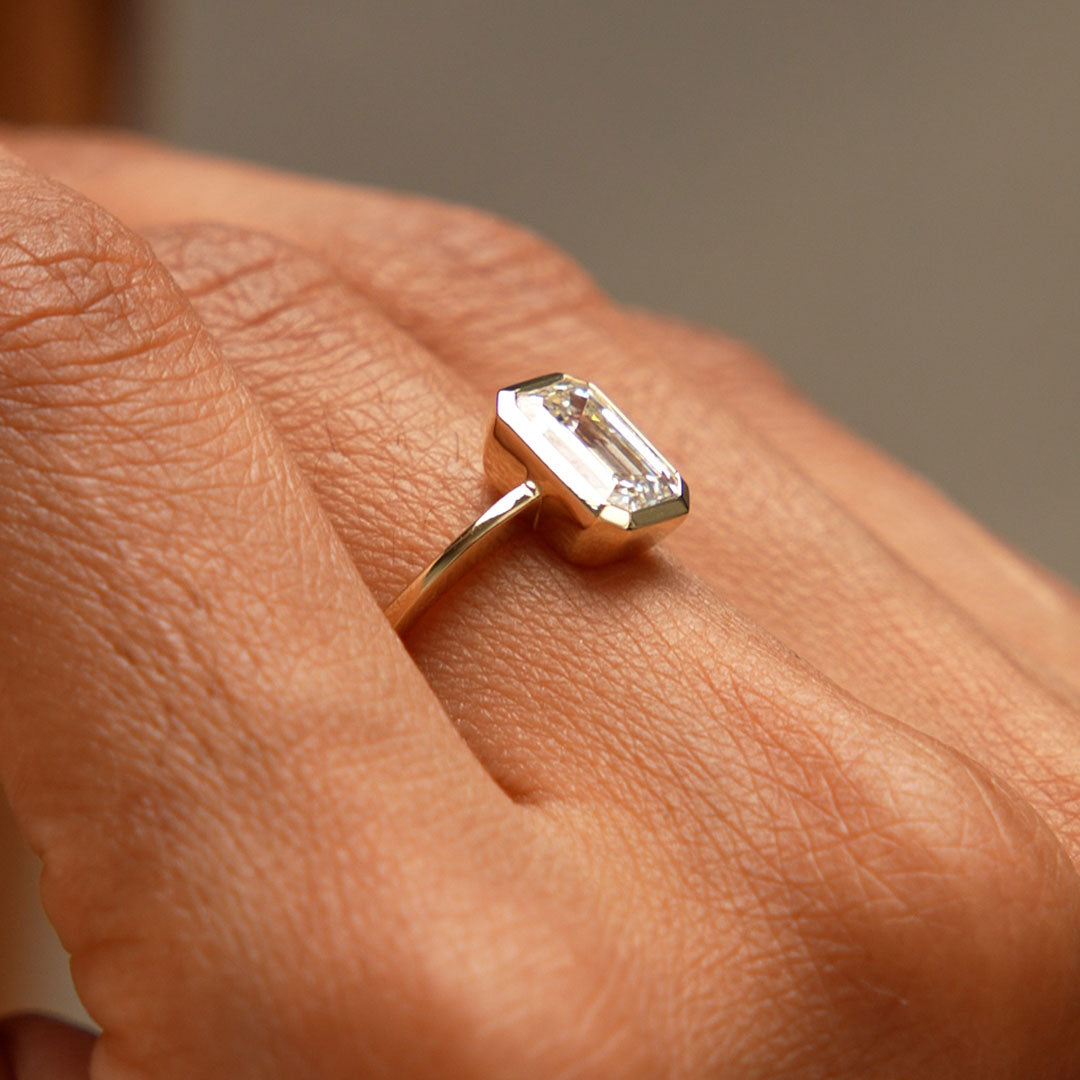Emerald Cut Lab Grown Diamond Bezel Set Engagement Ring