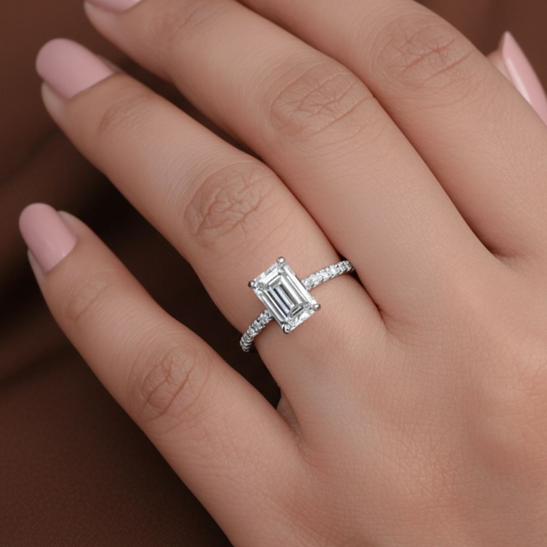 2ct Emerald_diamond_ring_with_pave_band