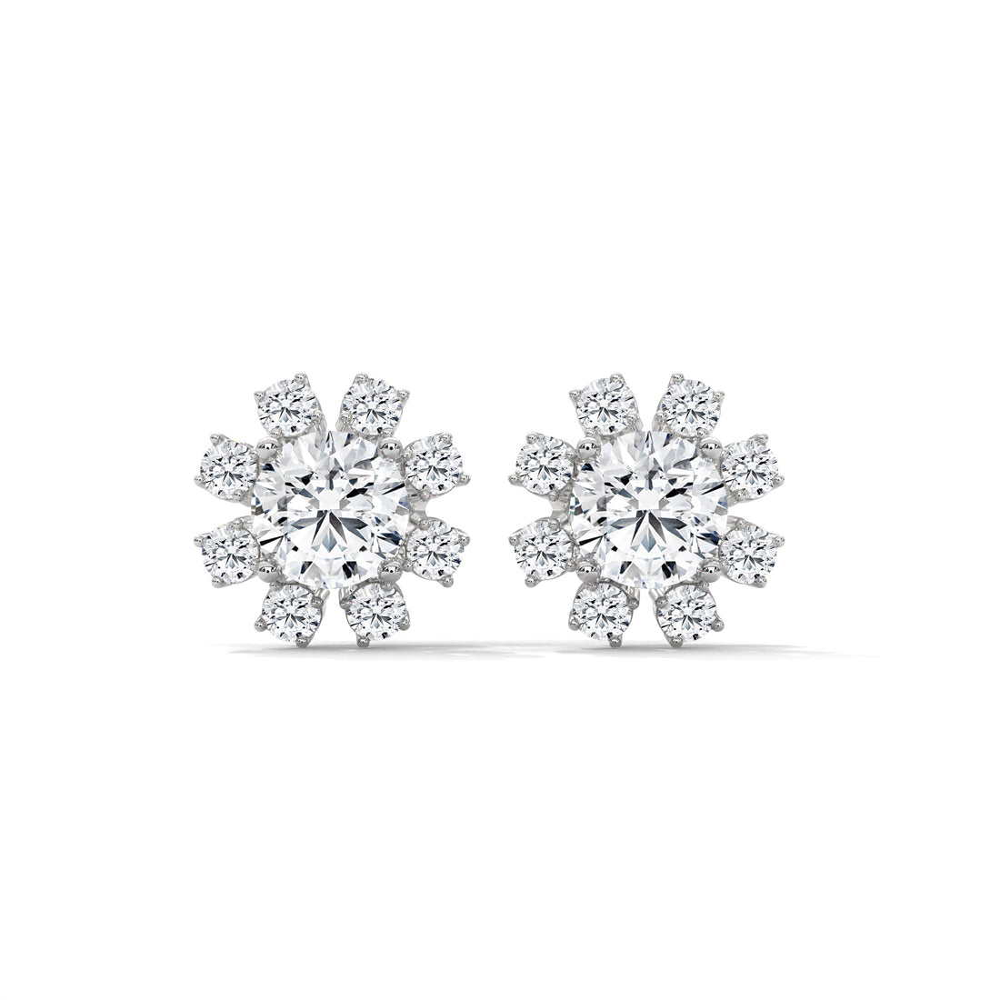 Pair of diamond earrings on a white background
