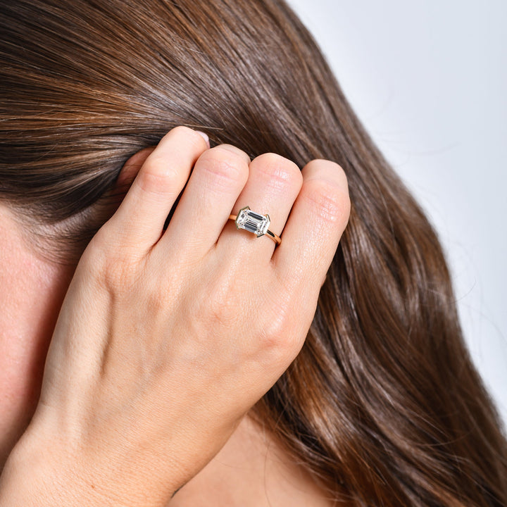 Half Bezel Set Emerald Cut Lab Grown Diamond Engagement Ring