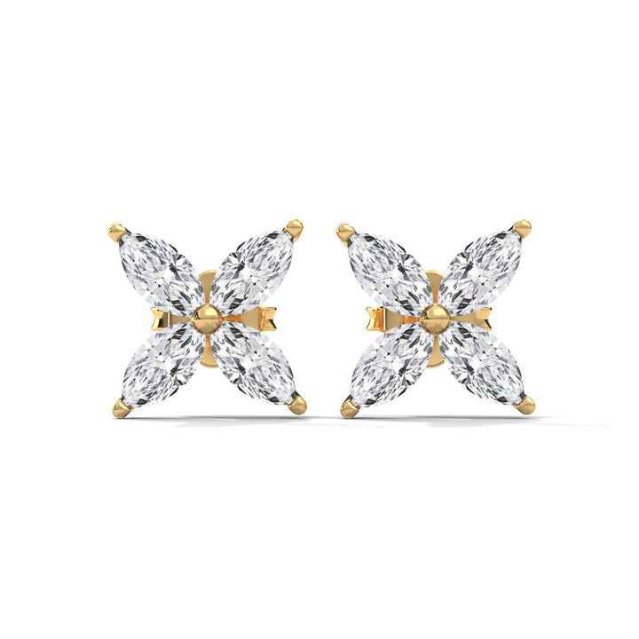 Gold butterfly-shaped earrings with clear diamond on a white background